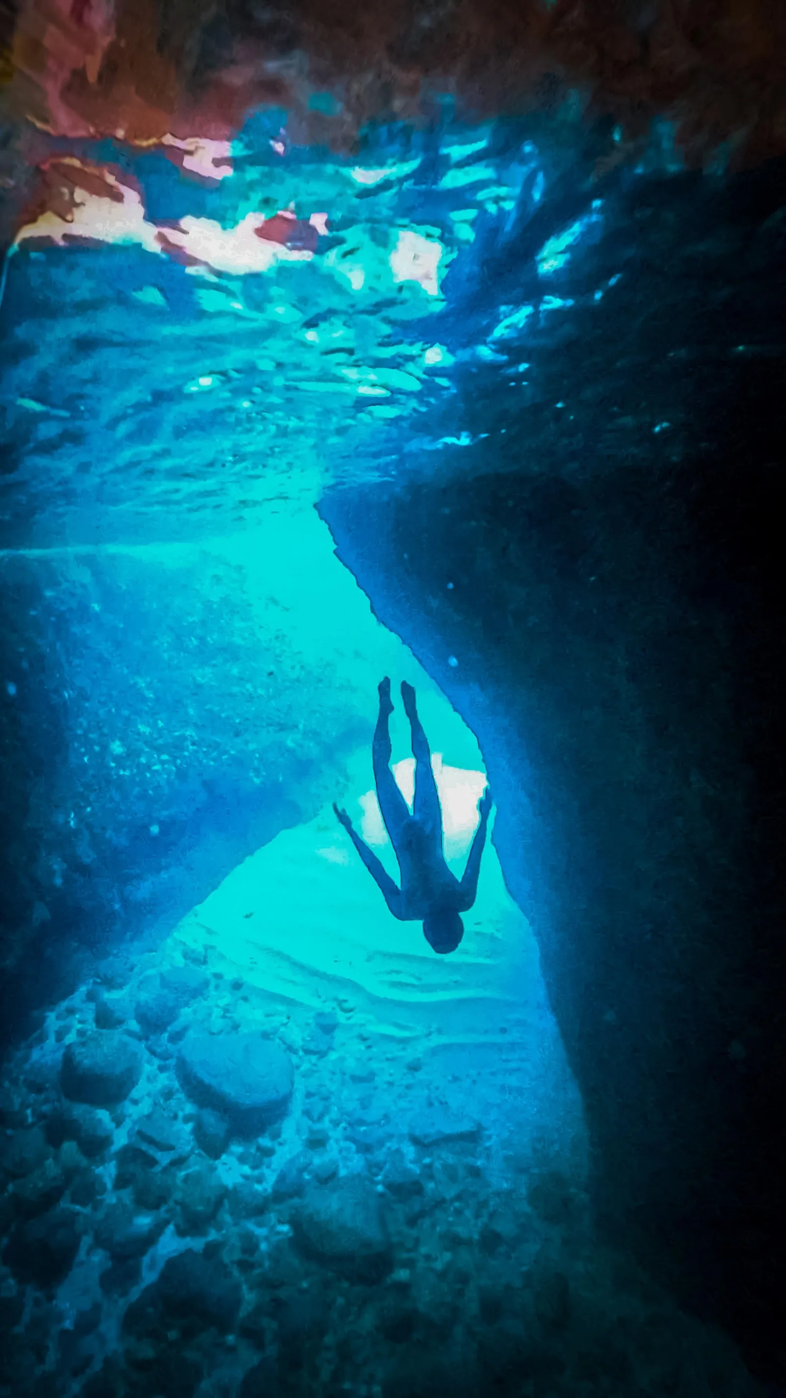 Swimming beside the limestone cliffs on a small-group boat trip